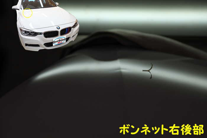 ＢＭＷボンネットのへこみ、修理前の写真