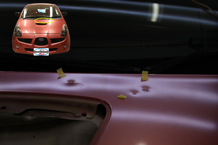 Ｒ１ボンネットのへこみ、修理前の写真